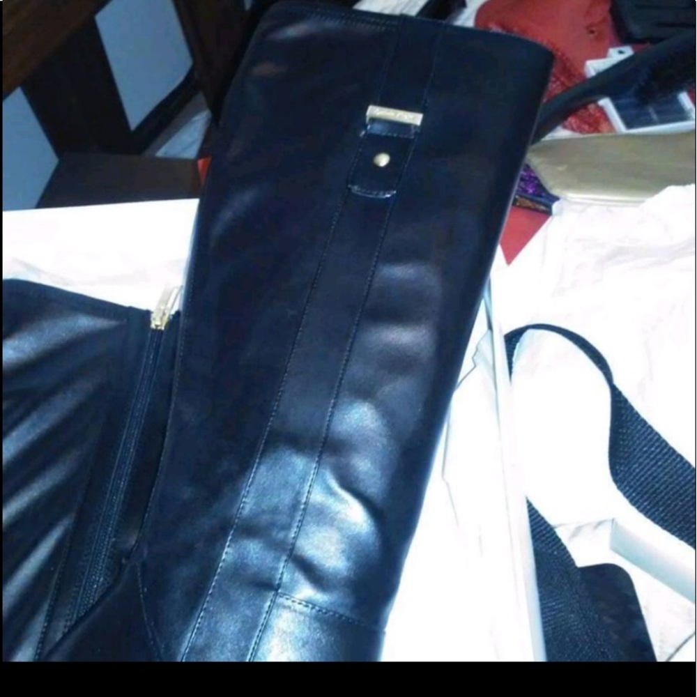 Calvin Klein black leather boots. Wore once